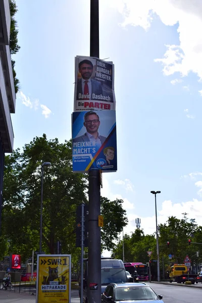 two political rally ads, one of the right wing and one of a satirical party, both for mayor in Koblenz