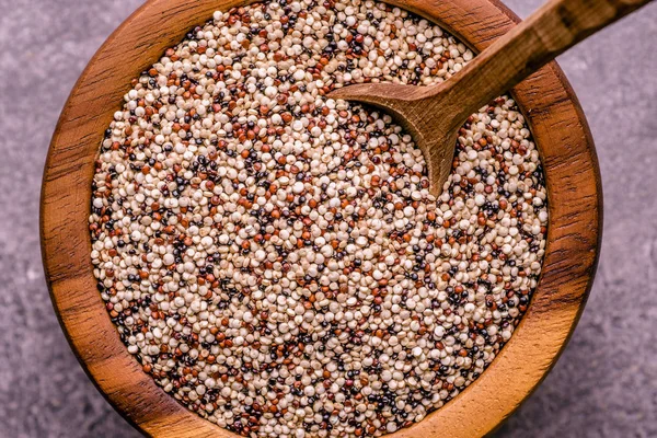 Organic Quinoa Grains in Rustic Wooden Bowl — Stock Photo, Image