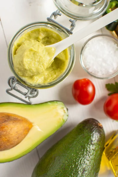 Vegan Raw and Healthy Fresh Food Concept. Organic Green Avocado Spread Guacamole in Jar. — Stock Photo, Image