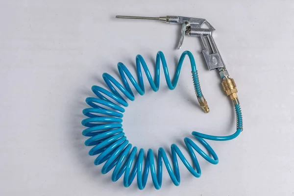 Air Compressor Blow Gun with Coiled Blue Hose — Stock Photo, Image