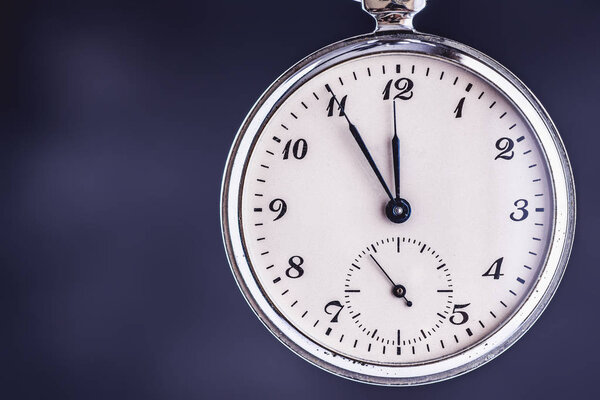 Vintage Pocket Watch on Dark Background. Deadline and Time Management Concept.
