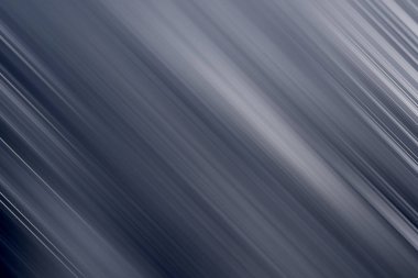 Bu resim modern soyut bir arkaplan sunuyor. Gri tonlarında köşegen çizgiler, parlak ve sofistike bir estetik sunuyor. Çok yönlü bir grafik öğesidir..