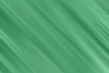 Bu soyut yeşil çizgili desen, çeşitli tasarım projeleri ve uygulamaları için modern ve stil bir arkaplan oluşturan çapraz çizgiler ve bulanık bir efekt içerir..