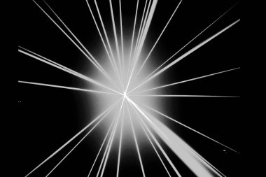 Dinamik ve soyut bir görüntü, parlak bir ışık patlamasını tasvir ediyor. Keskin, ince çizgiler, merkezi ve parlak bir çekirdekten dışarıya doğru uzanıyor..
