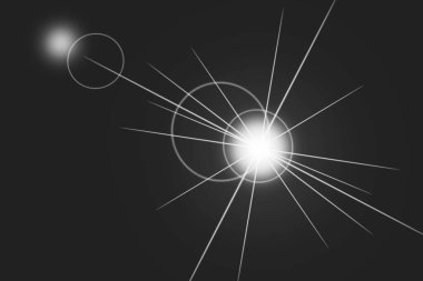 Işık saçan parlak bir yıldız patlaması efekti ve koyu arkaplana karşı iki eşmerkezli dairesel alev..