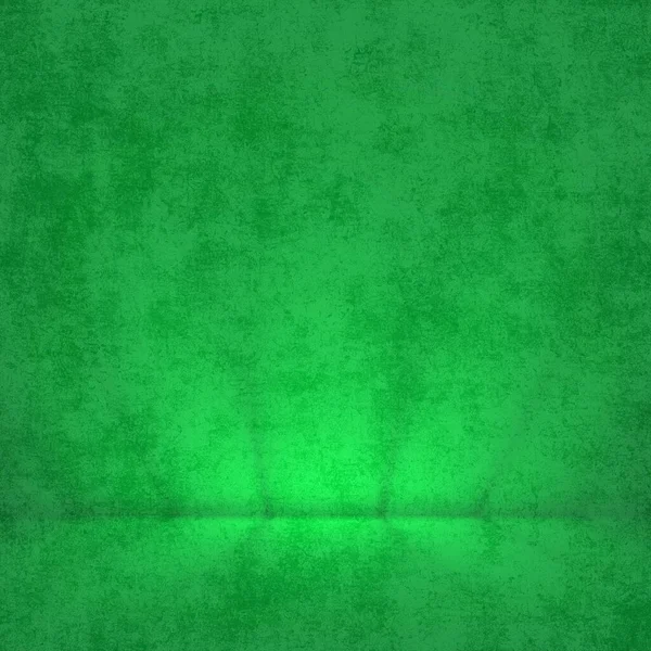 Zümrüt yeşili bir zümrüt arka plan. İnce bir eğim ve yerde bir ışık izi. Stüdyoya benzer bir atmosfer yaratıyor..