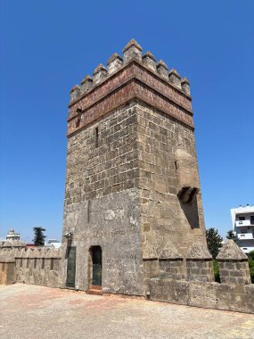 Spain: Historic Castillo de San Marcos in El Puerto de Santa Mara, a 13th-century fortress with Gothic towers and wine cellar, under summer light.