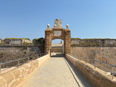 Spain: Historic Castillo de San Sebastin in Cdiz, a 1706 fortress on a small islet with a lighthouse and Atlantic views.