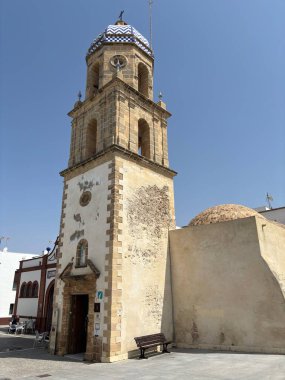 Torre de la Merced, the last remnant of Rota's 17th-century Convent of La Merced in Spain, now a tourist office with classic Andalusian architecture in a charming coastal town.
