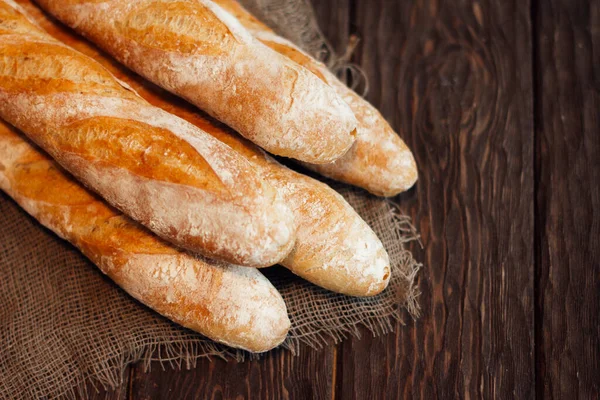 Fresh Baguettes Wooden Background — Stock Photo, Image