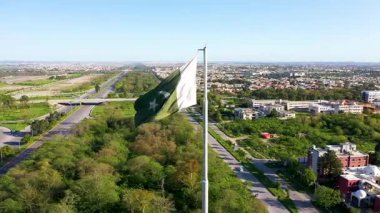 Proud Pakistani National Flag Flying Outdoors