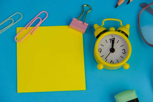 blank paper next to school tools with no word as a template for text space concept. business and education concept