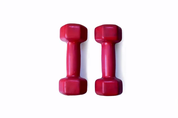 Beyaz arka plan (fitness üzerinde kırmızı eğitim dumbbells izole).