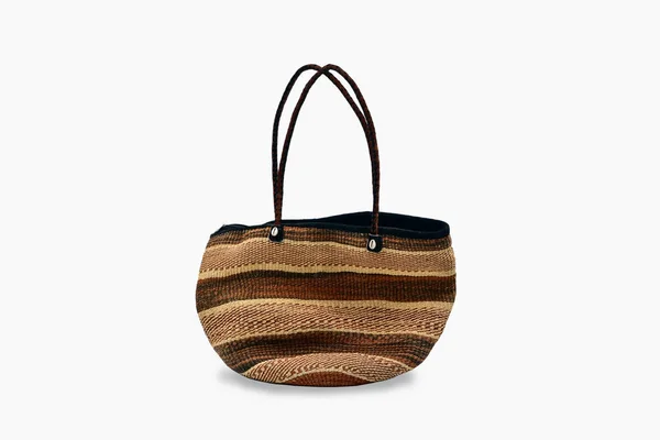 African sisal handmade basket (Kiondo) with Leather Straps isolated on white background