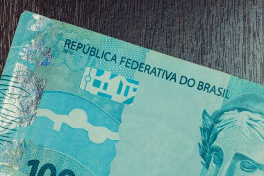 Closeup at 100 bill Brazilian money. Economy of Brazil concept i
