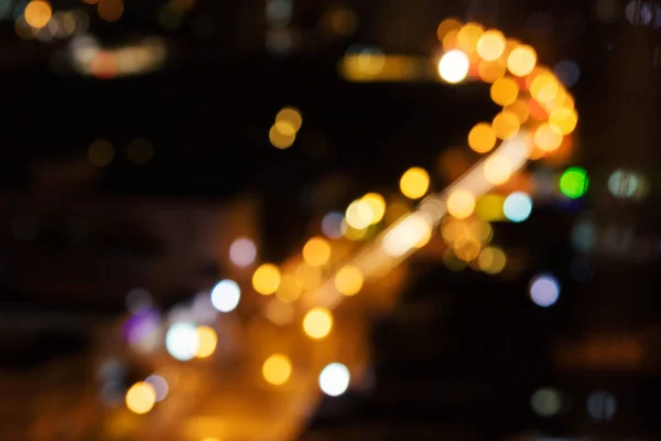 Colored bokeh city lights, abstract background concept image
