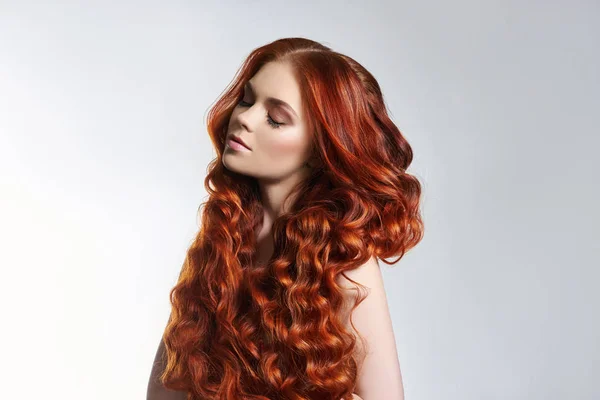 Creative bright coloring of a woman 's hair, careful care of the — стоковое фото