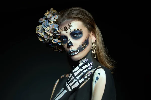 Halloween beauty skeleton woman makeup face. Girl death Halloween costume. Day of The Dead. Charming and dangerous Calavera Catrina