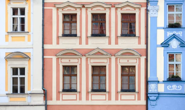 Colorful buildings facade with many windows. Historical buildings in the city of Prague, Czech Republic