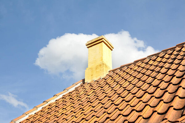 Old town of Odense, Denmark. HC Andersen's hometown. Tile roof with chimney.