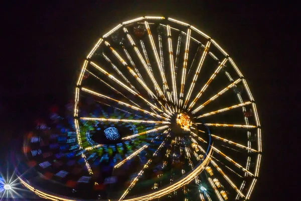 Ruota Panoramica Movimento Parco Divertimenti Illuminazione Notturna Lunga Esposizione — Foto Stock