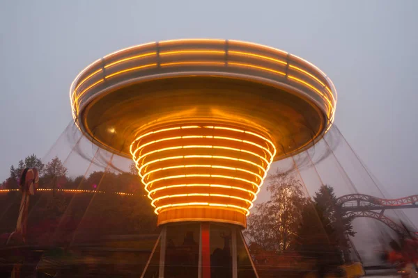 Blurry Colorful Chain Carousel Motion Amusement Park Evening Illumination Effect — Stock Photo, Image