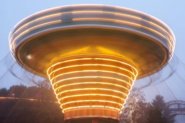 Blurry Colorful Chain Carousel Motion Amusement Park Evening Illumination Effect — Stock Photo, Image