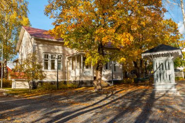 KOUVOLA, FINLAND - OCTOBER 10, 2018: Beautiful autumn in old rustic museum district of Kouvola - Kaunisnurmi, Museum of Radio. clipart