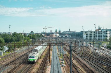 Helsinki,Finlandiya - 12 Haziran 2019: Helsinki tren istasyonu Wiew. Tren istasyondan kalkıyor