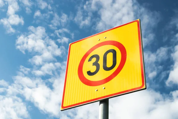 Finnish speed limit sign 30 km h on blue sky background — Stock Photo, Image