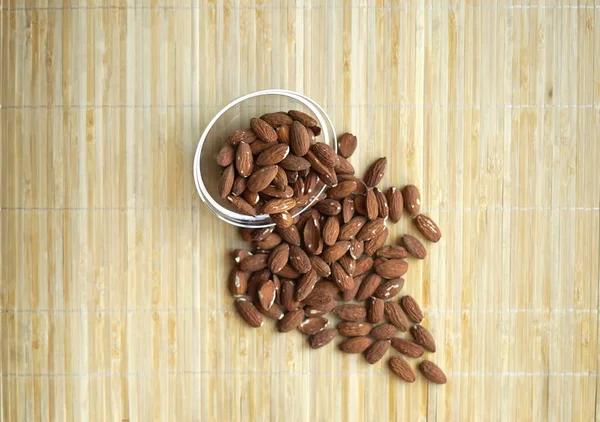 Healthy food  for background image close up almond nuts. Texture Nuts on the cup plate — Stock Photo, Image