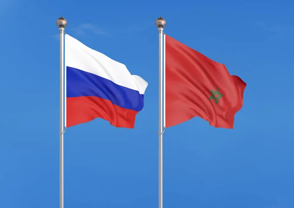俄罗斯 摩洛哥俄罗斯和摩洛哥的厚彩色丝绸国旗 天空背景上的 — 图库照片