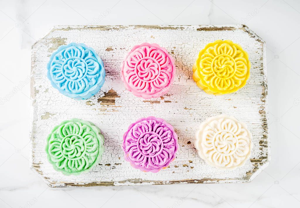 Traditional Chinese Mid-Autumn Festival food, colorful rice cakes snowskin mooncakes with variety of fillings,
