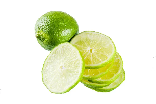 Limão fresco e hortelã sobre branco — Fotografia de Stock