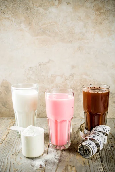 Chocolate, berry and vanilla protein shakes