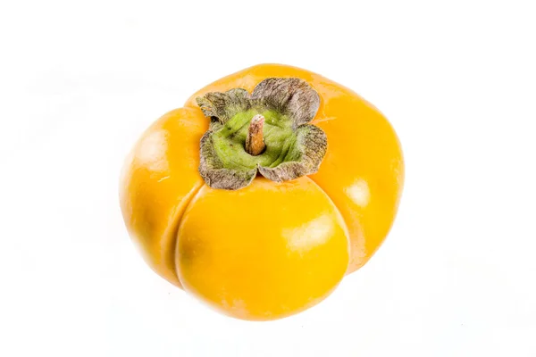 Persimmons inteiros e fatiados em branco — Fotografia de Stock