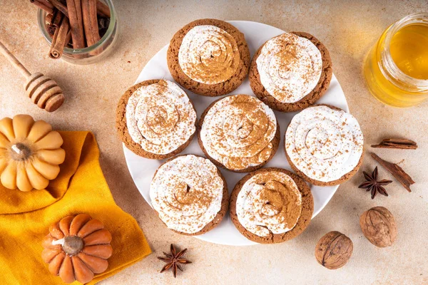 Pumpkin Pie Crumble Cookies Homemade Copycat Recipe. Tasty autumn american Crumble Cookies with Pumpkin Pie Spices and Whipped cream frosting on top, fall seasonal taste idea