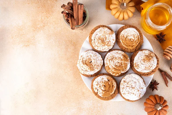Pumpkin Pie Crumble Cookies Homemade Copycat Recipe. Tasty autumn american Crumble Cookies with Pumpkin Pie Spices and Whipped cream frosting on top, fall seasonal taste idea