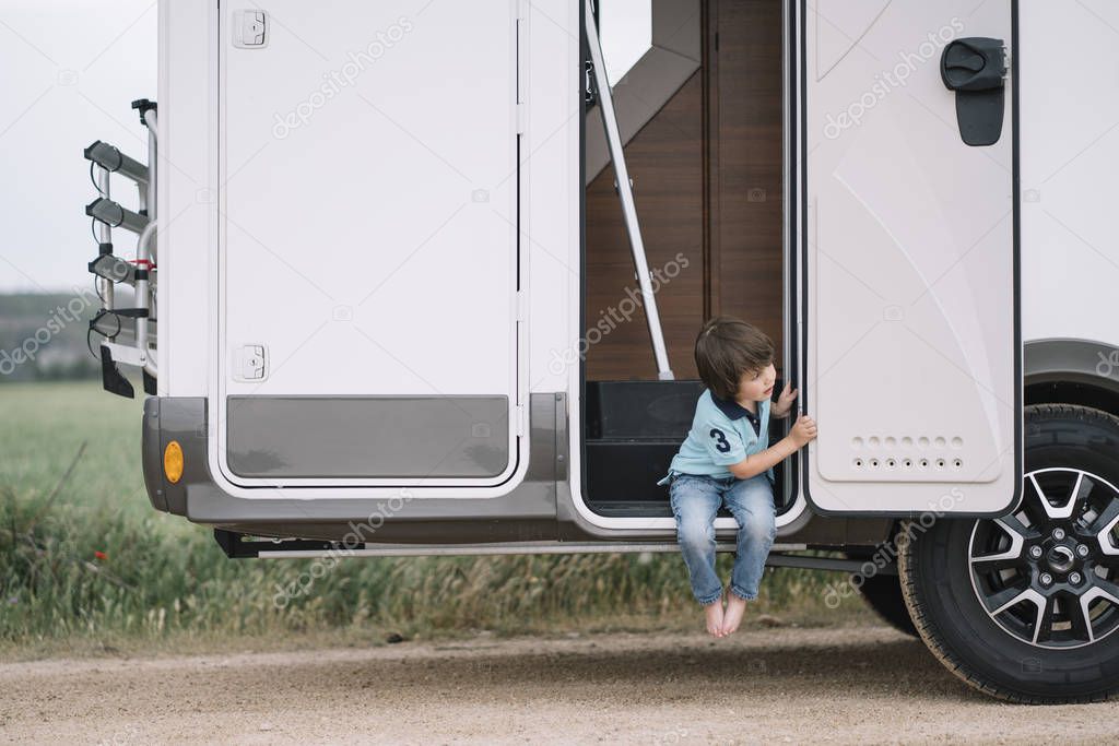 Little boy in a caravan