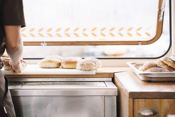 Making burgers in a fast food van