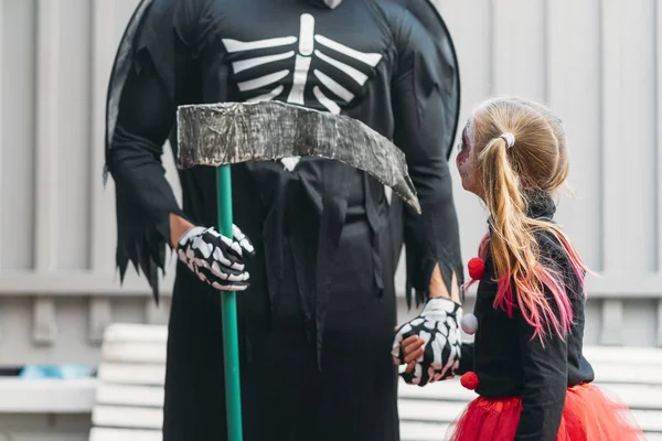 Child with skeleton , dressed in costume for Halloween party. — Stock Photo, Image