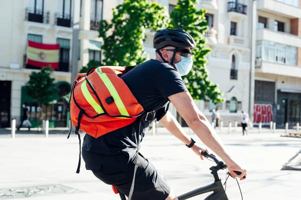 bike messenger with bag on the back