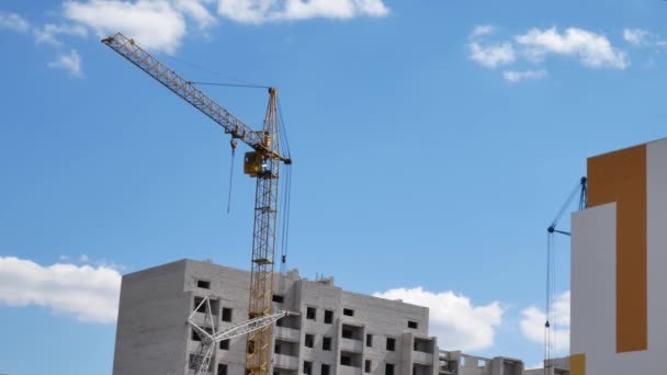 Construction cranes for building skyscraper — Stock Video