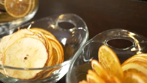 Dried orange fruits slices and spices for making alcoholic drink — Stock Video