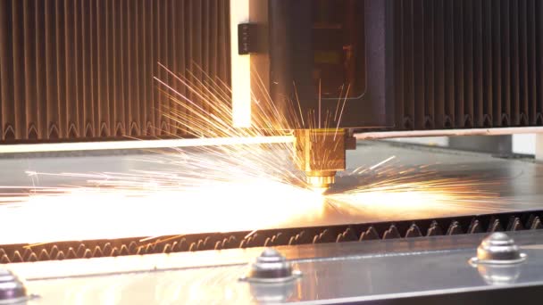 CNC laser cut machine cutting sheet metal with sparking light — Stock Video