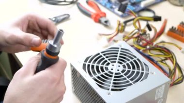 Preparing screwdriver for repair power supply computer