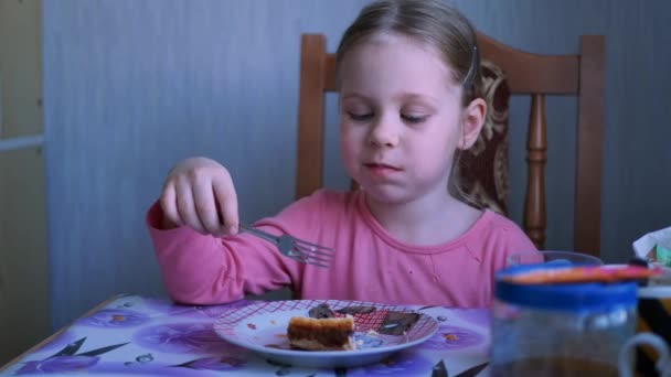 Child Girl Eating Cottage Cheese Casserole at Home — Stock Video