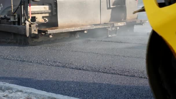 Paver Finisher Placing Layer of Asphalt During Repaving Construction — 비디오