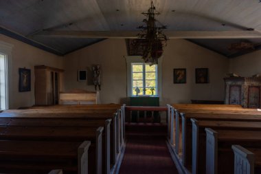 Old wooden church in Finland. Nordic architecture, peaceful atmosphere, Christian heritage, and traditional northern culture