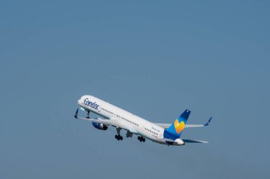 Berlin Germany - April 21. 2018: Condor Boeing 757-300 airplane take off from Berlin Tegel airport clipart